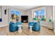Relaxed game room featuring cozy beanbags, television, and window views perfect for indoor entertainment at 2500 Gulf N Dr, Bradenton Beach, FL 34217