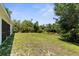Expansive backyard with lush greenery and natural landscape at 2575 Johannesberg Rd, North Port, FL 34288