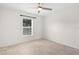 Bright bedroom with a window and a ceiling fan at 2575 Johannesberg Rd, North Port, FL 34288