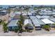 Aerial view of the community showcasing cozy homes, palm trees and a community pool at 2601 Gulf N Dr # 733, Bradenton Beach, FL 34217