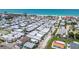 Property aerial, nestled in community with beach access and walkable area at 2601 Gulf N Dr # 733, Bradenton Beach, FL 34217