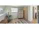 The bedroom features ample storage space and a view into an adjacent living area at 2601 Gulf N Dr # 733, Bradenton Beach, FL 34217
