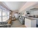 Cozy living area with combined kitchen, offering comfortable seating and ample natural light at 2601 Gulf N Dr # 733, Bradenton Beach, FL 34217