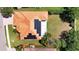 A high angle view of a house with solar panels on the roof at 2729 Harvest Dr, Sarasota, FL 34240