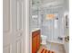 Bathroom featuring a glass shower enclosure, tile floors and a wood vanity at 2729 Harvest Dr, Sarasota, FL 34240