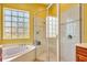 Spacious bathroom with a shower and a bathtub at 2729 Harvest Dr, Sarasota, FL 34240