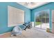 Inviting bedroom with sliding doors and a view of the outdoors at 2729 Harvest Dr, Sarasota, FL 34240