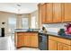 Open kitchen with dark countertops and plenty of cabinet space at 2729 Harvest Dr, Sarasota, FL 34240
