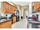 Bright kitchen featuring tile floors, plentiful cabinets and a clean aesthetic at 2729 Harvest Dr, Sarasota, FL 34240