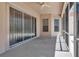 Covered patio featuring a ceiling fan and clear weather protection at 2729 Harvest Dr, Sarasota, FL 34240