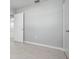 This cozy bedroom features neutral walls and tiled flooring, offering a blank canvas for personalization and comfortable living at 2739 Palmadelia Ave, Sarasota, FL 34234