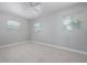 This bedroom features neutral walls and tiled flooring, offering a blank canvas for personalization and comfortable living at 2739 Palmadelia Ave, Sarasota, FL 34234