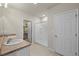 Bright bathroom features double sinks, walk in closet, and walk in shower at 27519 Pasto Dr, Punta Gorda, FL 33983