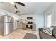 Modern kitchen features stainless steel appliances and white cabinetry at 301 Highland Ave # 3, Bradenton Beach, FL 34217