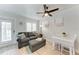 Cozy living room features a comfortable sofa, dining table, and stylish decor at 301 Highland Ave # 3, Bradenton Beach, FL 34217