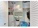 Utility closet with water heater, HVAC system and room for storage at 301 Highland Ave # 3, Bradenton Beach, FL 34217