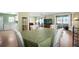 Dining area with views of the living room and sunroom, offering a seamless flow at 307 White Oak Way, Sarasota, FL 34237