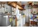 Laundry room featuring a sink, washing machine, dryer, and shelving for storage at 307 White Oak Way, Sarasota, FL 34237