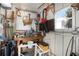 Workshop space with pegboard, tools, a workbench, and natural light from the window at 307 White Oak Way, Sarasota, FL 34237