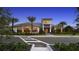 Beautiful modern exterior with manicured landscaping and a grand entrance at 3221 Vicenza Ct, Bradenton, FL 34211