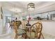 Inviting dining area next to an open kitchen and living room, perfect for entertaining and everyday living at 3269 Beneva Rd # 103, Sarasota, FL 34232