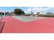 Well-maintained tennis court with ample seating, offering residents a perfect space for recreation and exercise at 3269 Beneva Rd # 103, Sarasota, FL 34232