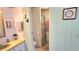 Bathroom featuring a vanity with sink, toilet and shower/tub combination at 3308 Oakwood S Blvd, Sarasota, FL 34237