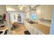 Functional kitchen with ample counter space, neutral tile flooring, and essential appliances at 3308 Oakwood S Blvd, Sarasota, FL 34237