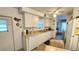Well-equipped kitchen with ample counter space, white cabinetry, and functional appliances at 3308 Oakwood S Blvd, Sarasota, FL 34237
