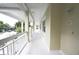 Bright hallway with white columns, offering a welcoming and well-lit entrance to the condos at 3803 54Th W Dr # 201, Bradenton, FL 34210
