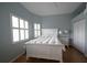 Relaxing main bedroom with light-filtering shutters, hardwood floors, and a closet for ample storage at 3803 54Th W Dr # 201, Bradenton, FL 34210