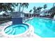 Resort-style pool area includes a spa with tiered seating, perfect for relaxation at 3803 54Th W Dr # 201, Bradenton, FL 34210