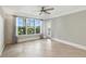 Inviting bedroom featuring natural light and access to the outdoor space at 4037 Crockers Lake Blvd # 14, Sarasota, FL 34238