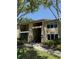 Inviting condo building with landscaped grounds, offering serene residential living and easy access at 4037 Crockers Lake Blvd # 14, Sarasota, FL 34238