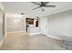 Open concept living and dining area with abundant natural light at 4037 Crockers Lake Blvd # 14, Sarasota, FL 34238