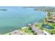 Waterfront community with private docks, lush green space, and scenic water views at 4234 Gulf Of Mexico Dr # G2, Longboat Key, FL 34228
