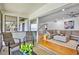 Inviting living room extends to an outdoor patio with a comfortable seating arrangement at 4234 Gulf Of Mexico Dr # G2, Longboat Key, FL 34228
