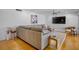 Comfortable living room showcasing a large sectional sofa and modern decor at 4234 Gulf Of Mexico Dr # G2, Longboat Key, FL 34228