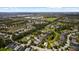An aerial view shows a beautiful community, lakes, and lush green landscaping at 4402 Natures Reach Ter, Parrish, FL 34219