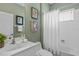 Well-lit bathroom features a shower/tub combo and neutral tones at 4402 Natures Reach Ter, Parrish, FL 34219