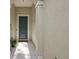Inviting front entryway featuring a stylish door, textured walls, and ample natural light at 4402 Natures Reach Ter, Parrish, FL 34219