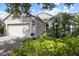 Charming single-Gathering home featuring lush landscaping and an attached two-car garage at 4402 Natures Reach Ter, Parrish, FL 34219