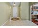 Open foyer with tile flooring, leading to the kitchen; great home for entertaining at 4402 Natures Reach Ter, Parrish, FL 34219