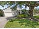 Charming home with a well-maintained lawn and mature landscaping at 4402 Natures Reach Ter, Parrish, FL 34219
