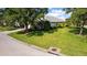 Well-maintained front lawn and landscaped yard, enhancing the home's curb appeal at 4402 Natures Reach Ter, Parrish, FL 34219