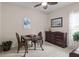 Comfortable office space with a desk, dresser, and a ceiling fan at 4402 Natures Reach Ter, Parrish, FL 34219