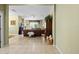 Bright and spacious open floorplan with tan tile, seamlessly connecting the living spaces at 4402 Natures Reach Ter, Parrish, FL 34219