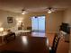 Comfortable living room with a sofa, tile floors, and natural lighting at 4607 W North B St # 105, Tampa, FL 33609