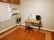 Office with minimalist desk, chair, shelving and a tiled floor at 4607 W North B St # 105, Tampa, FL 33609