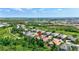 Aerial view of the neighborhood showcasing beautiful landscaping, golf course, and scenic views at 4818 88Th E St, Bradenton, FL 34211